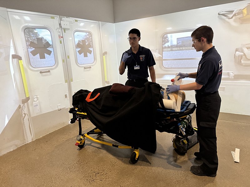 ems students in sim room
