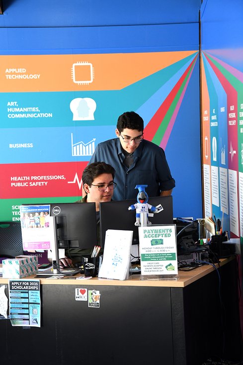 student workers at a computer