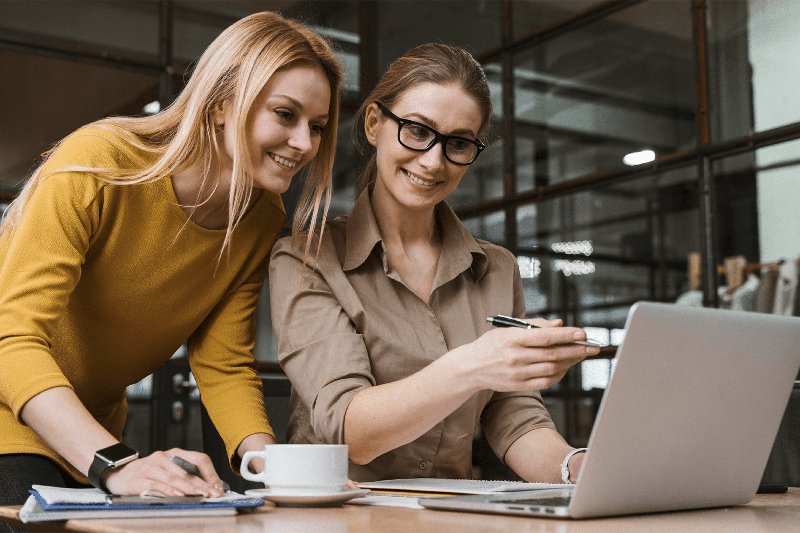 advising in front of a laptop